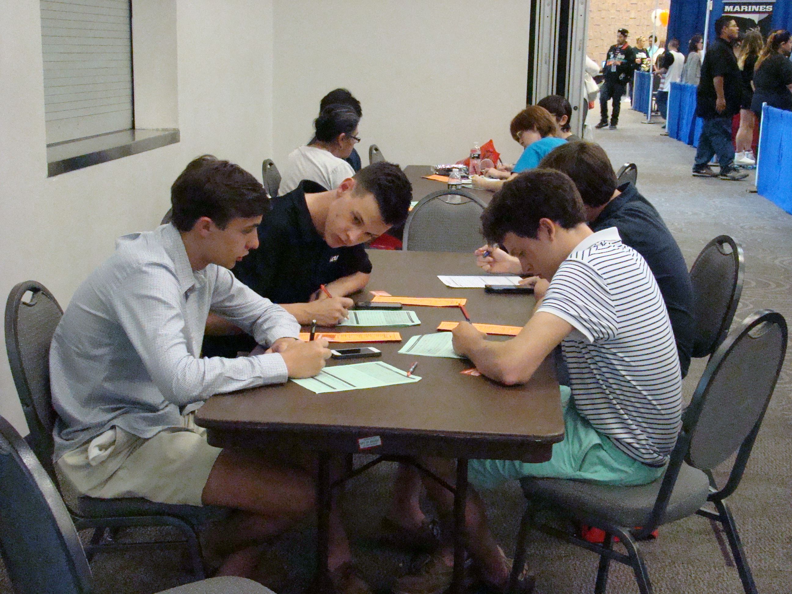 Attendees completing applications